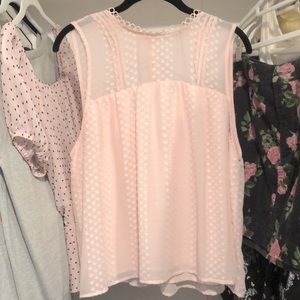 Sleeveless pale pink blouse